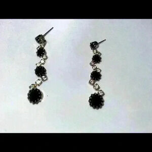 Black and rhinestone dangle earrings.